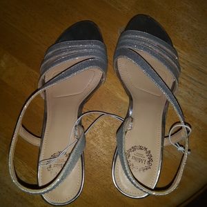 I.MillerNannett Silver Glitter Pumps.